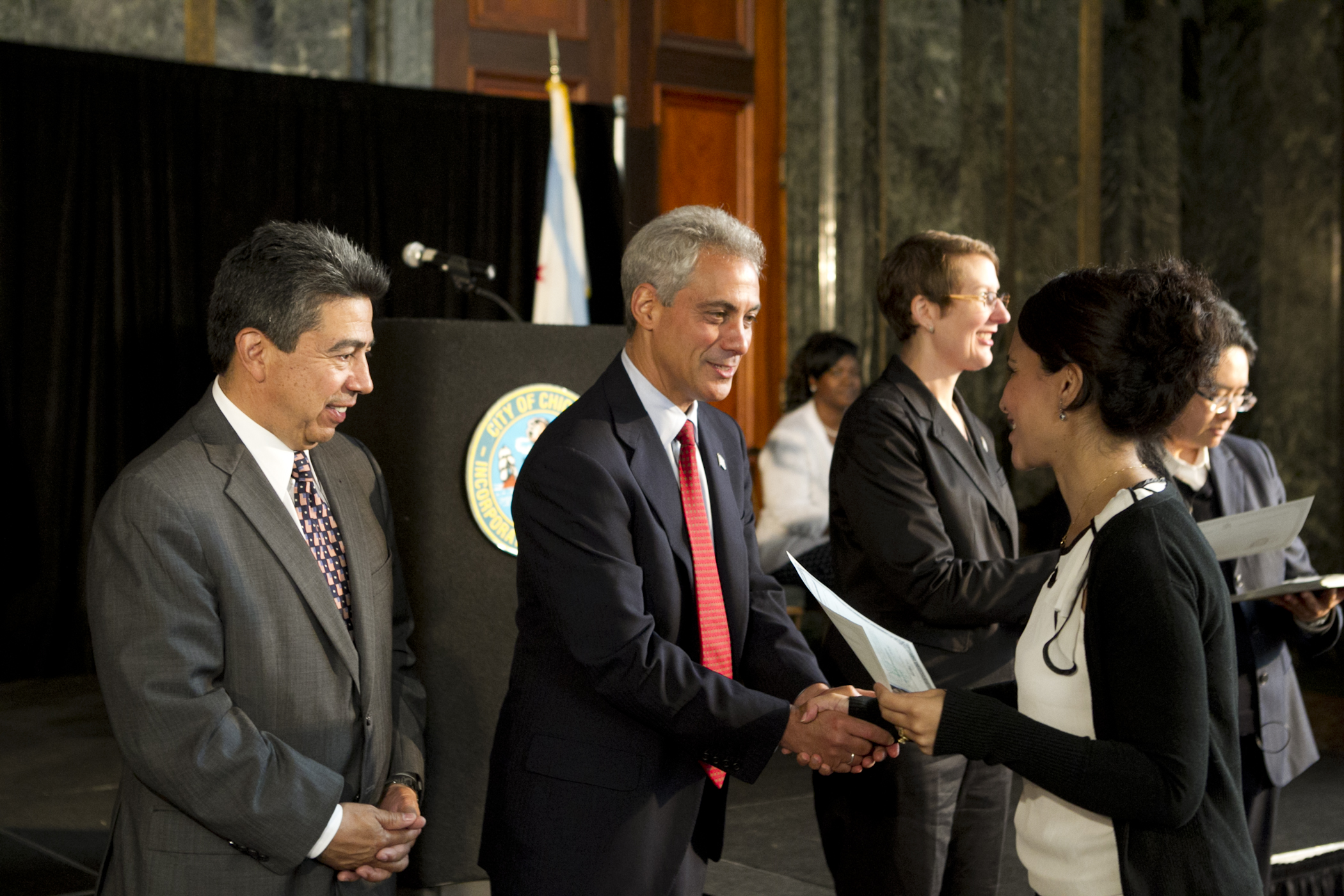 Mayor Emanuel congratulates newly naturalized citizens representing 32 countries at the Chicago Cultural Center.